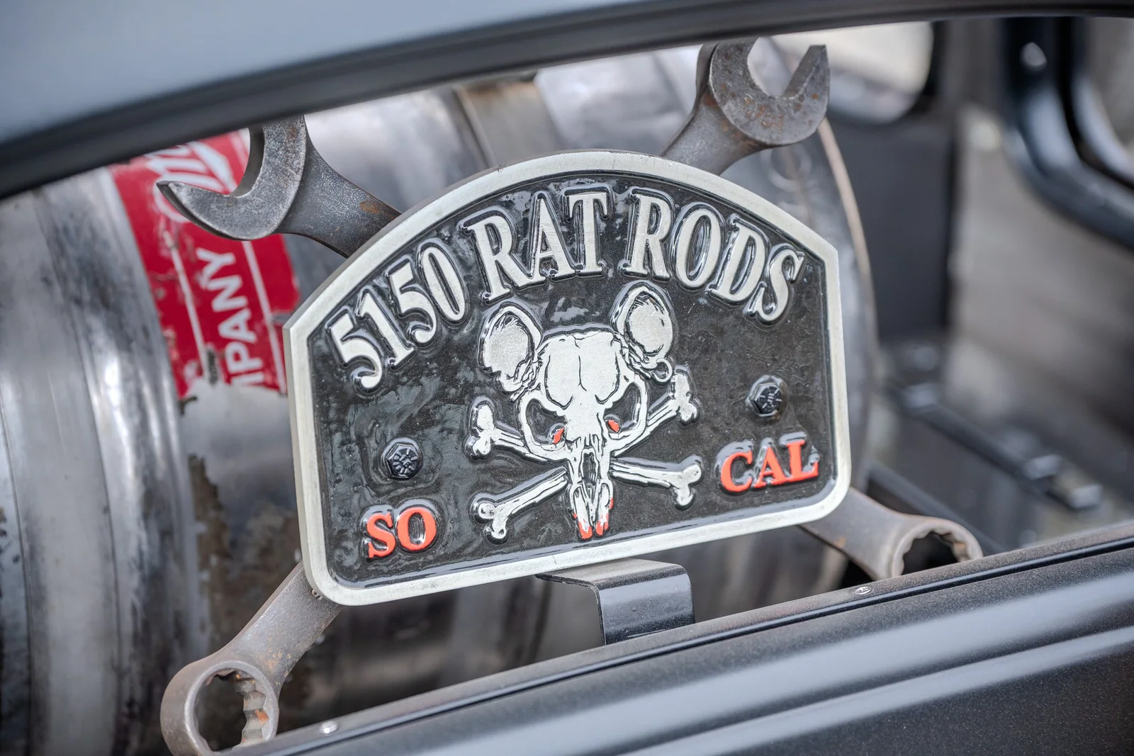 Rat-and-wrenches plaque reading 5150 Rat Rods So Cal.