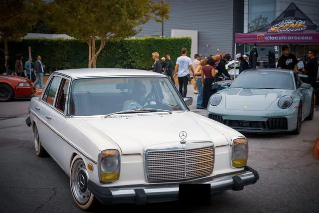 White vintage Mercedes photographed at a car gathering.