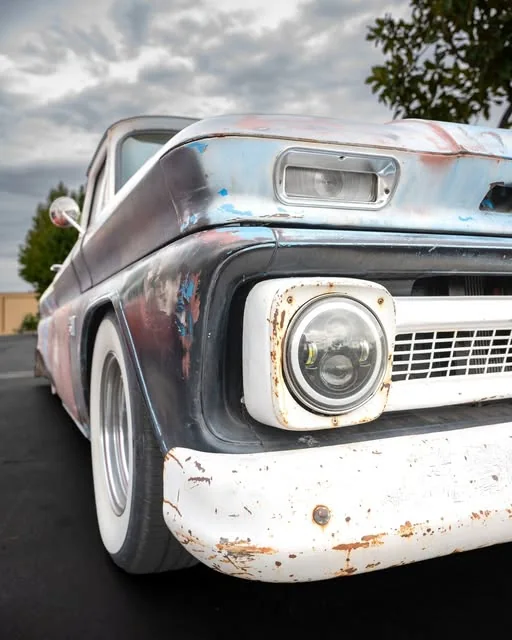 Weathered classic pickup truck close-up.